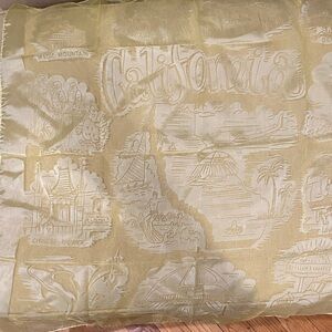 California Souvenir scarf in yellow with different tourist locations.